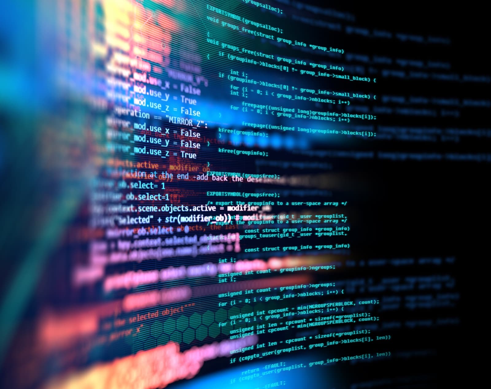 プログラミングのコードが映ったPCディスプレイのイメージ画像